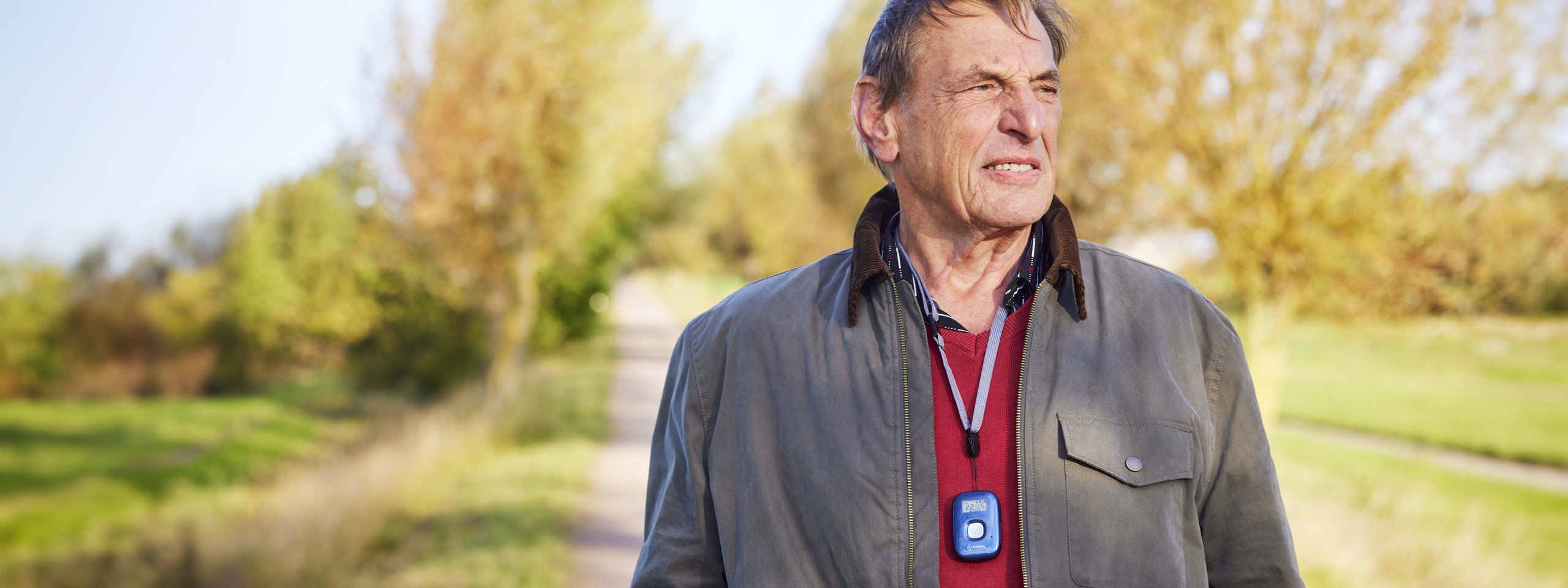 A gentleman walking with an out-and-about personal alarm