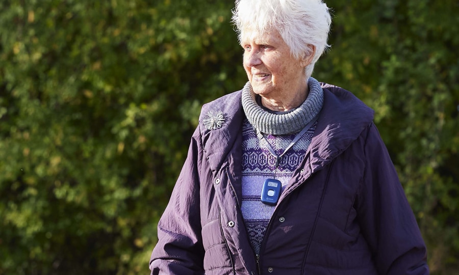 A lady out for a walk with an out-and-about personal alarm