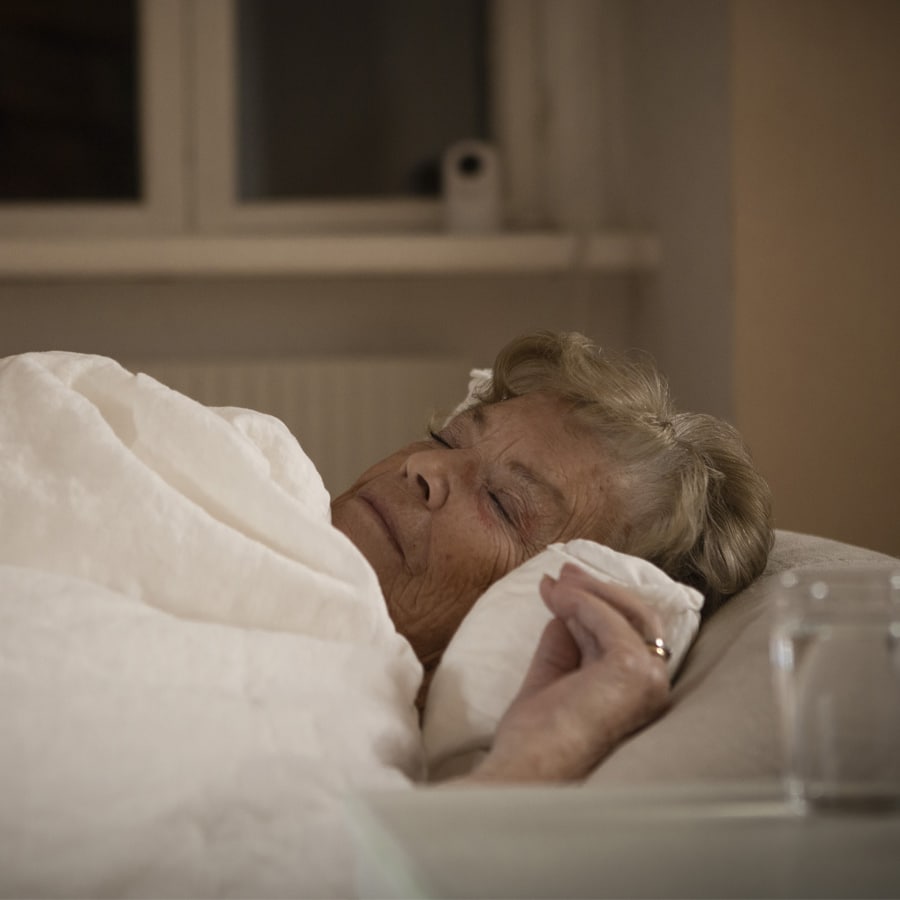 A woman sleeping peacfully in her bed